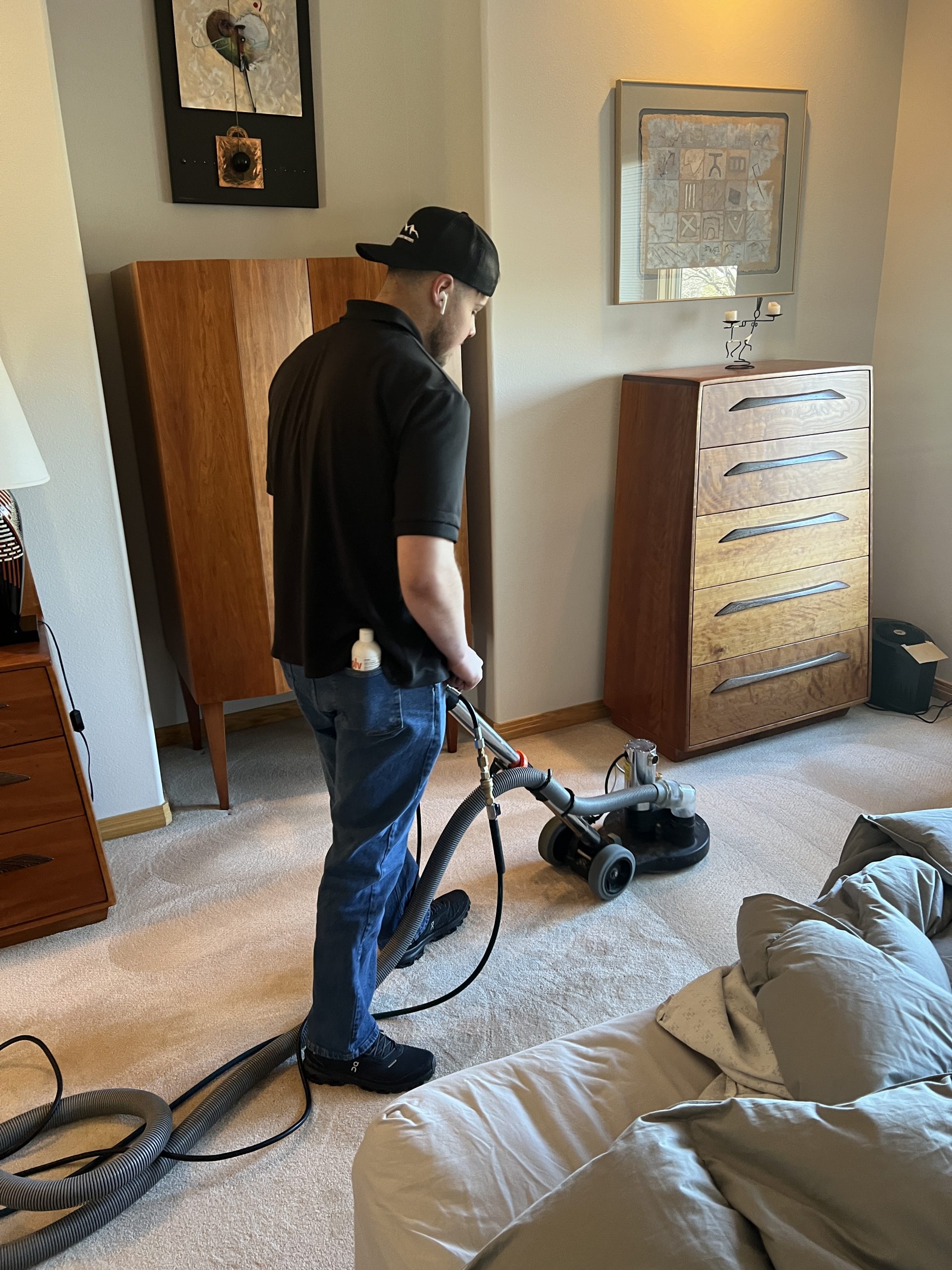 Colorado Carpet Masters is carpet cleaning in Firestone CO using the T-Rex power wand which scrubs the carpets from a multitude of directions.