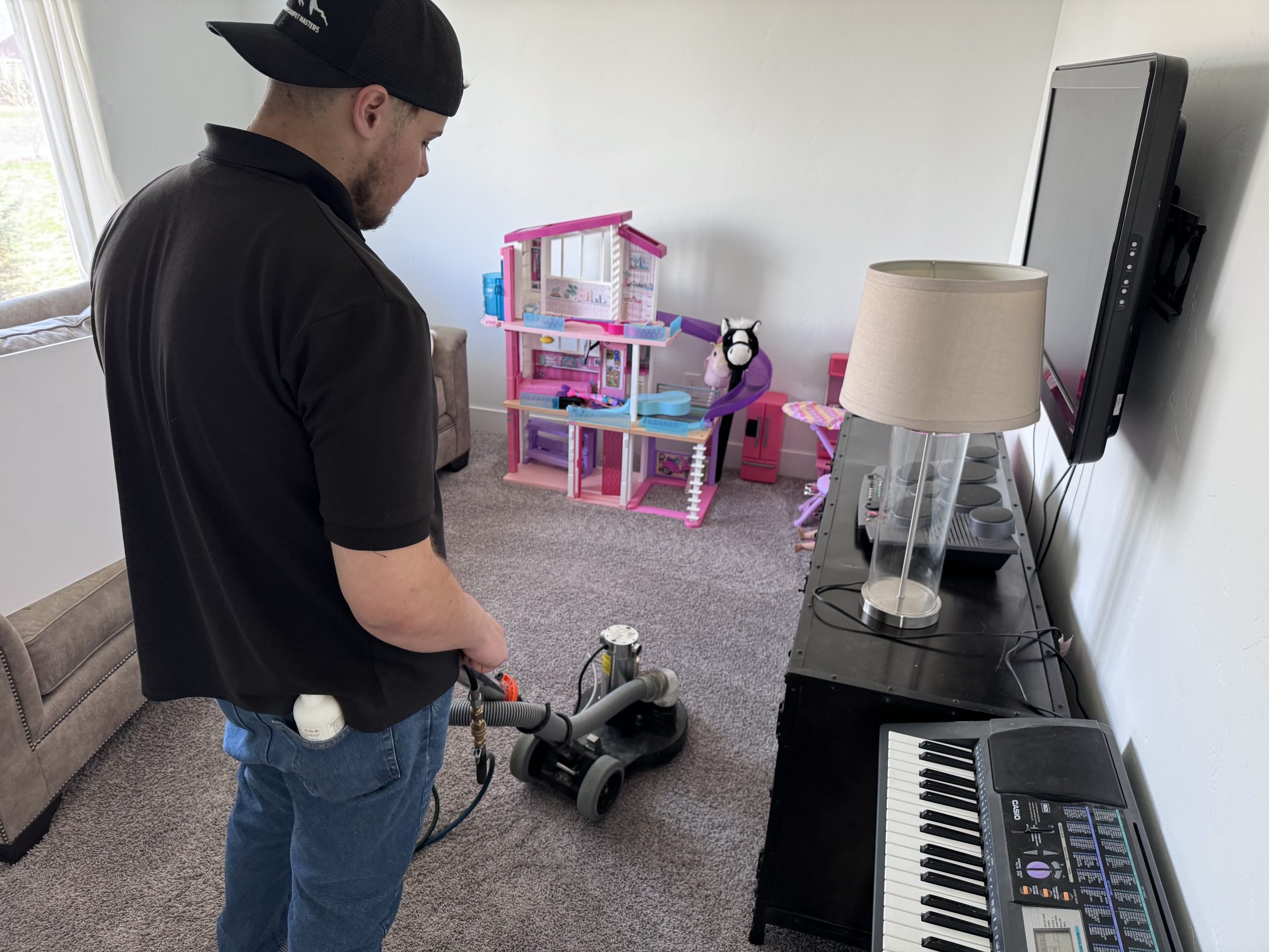 colorado carpet masters technician deliberately carpet cleaning in commerce city around various childrens toys